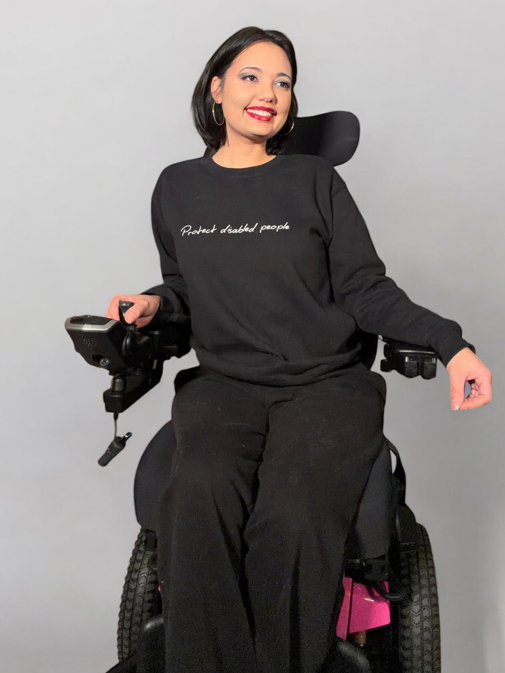 Crewneck Sweatshirt — "Protect disabled people" Minimal Script Disabled Rights Tee