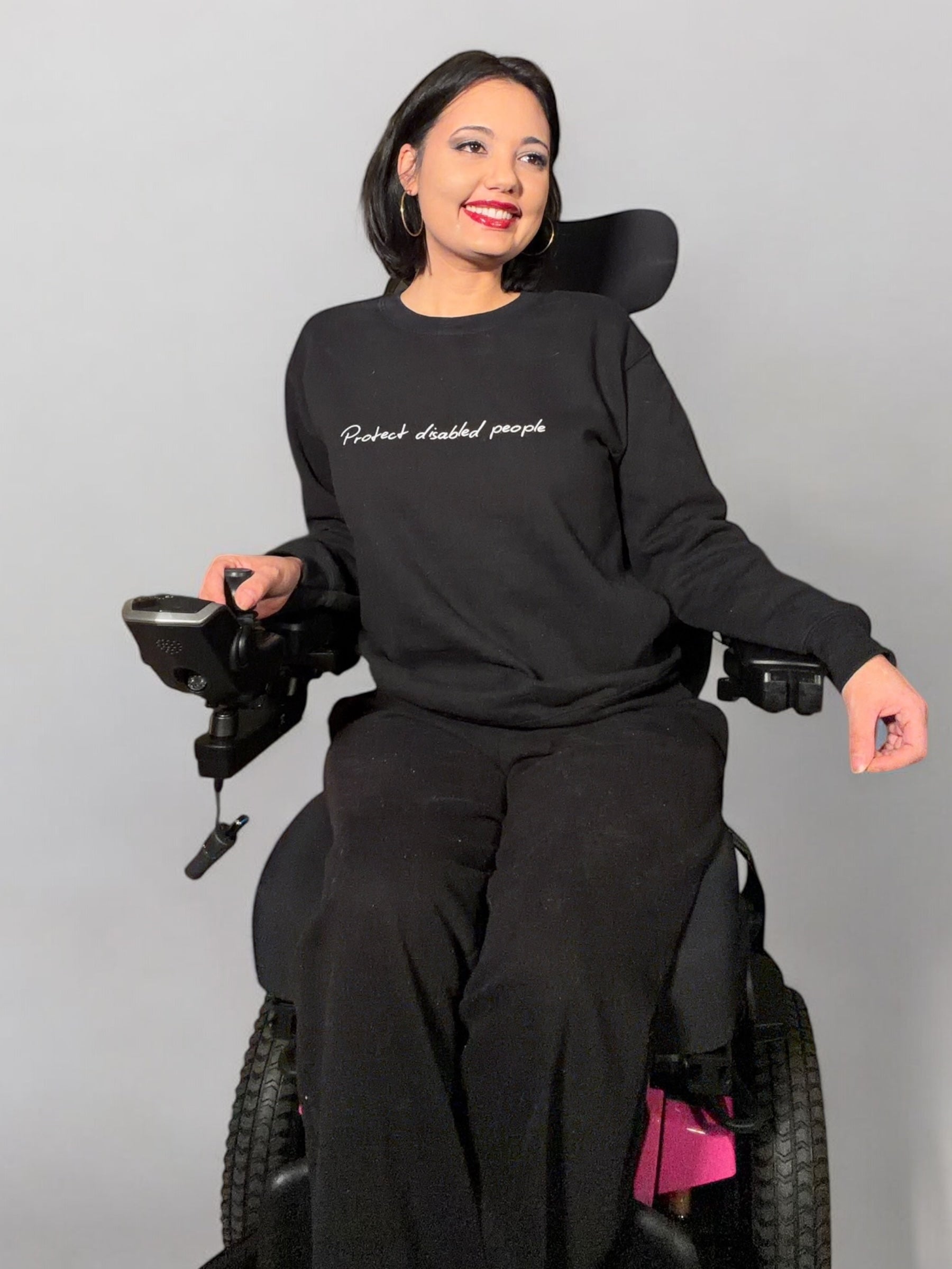 Crewneck Sweatshirt — "Protect disabled people" Minimal Script Disabled Rights Tee