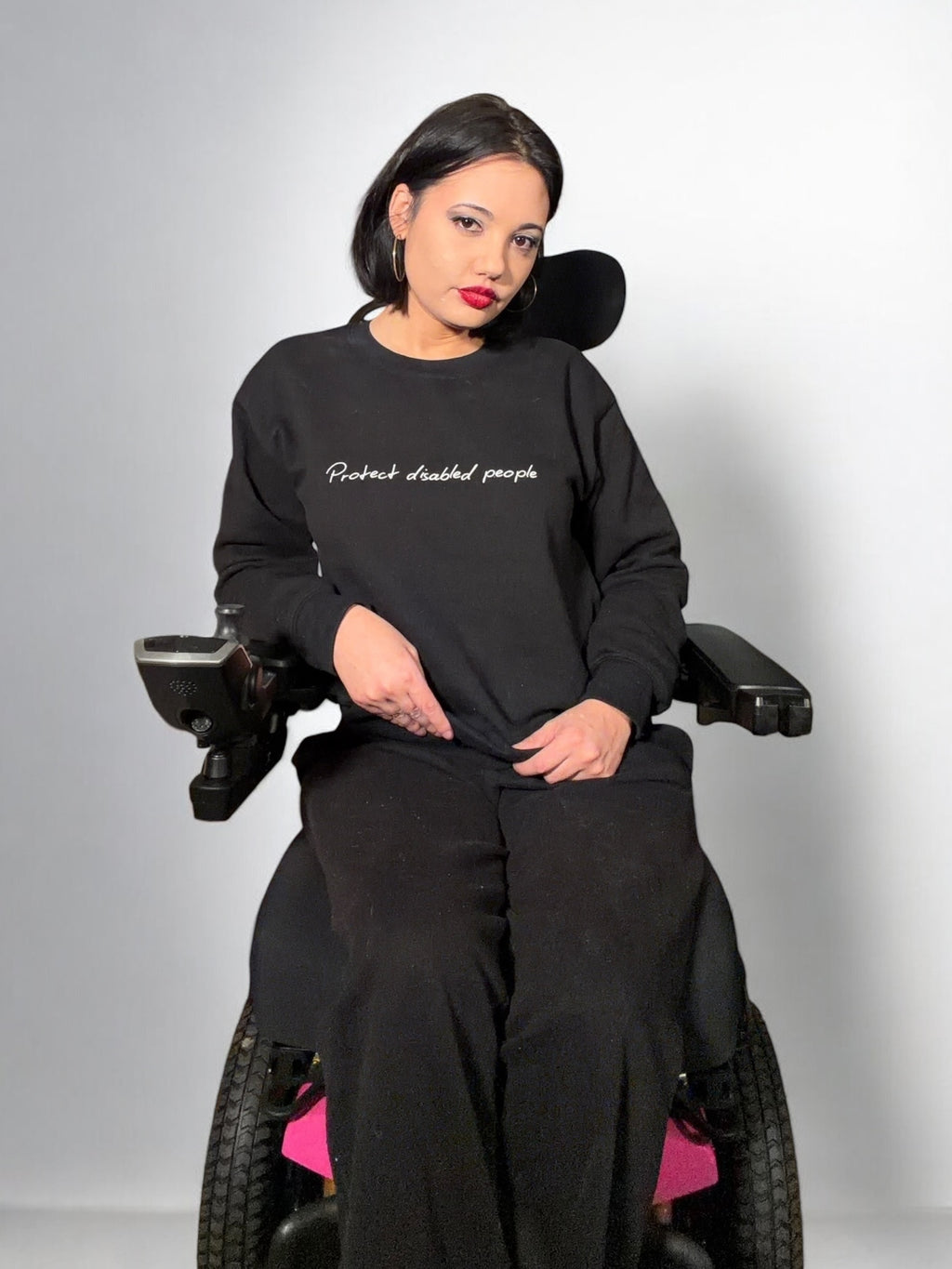 Crewneck Sweatshirt — "Protect disabled people" Minimal Script Disabled Rights Tee